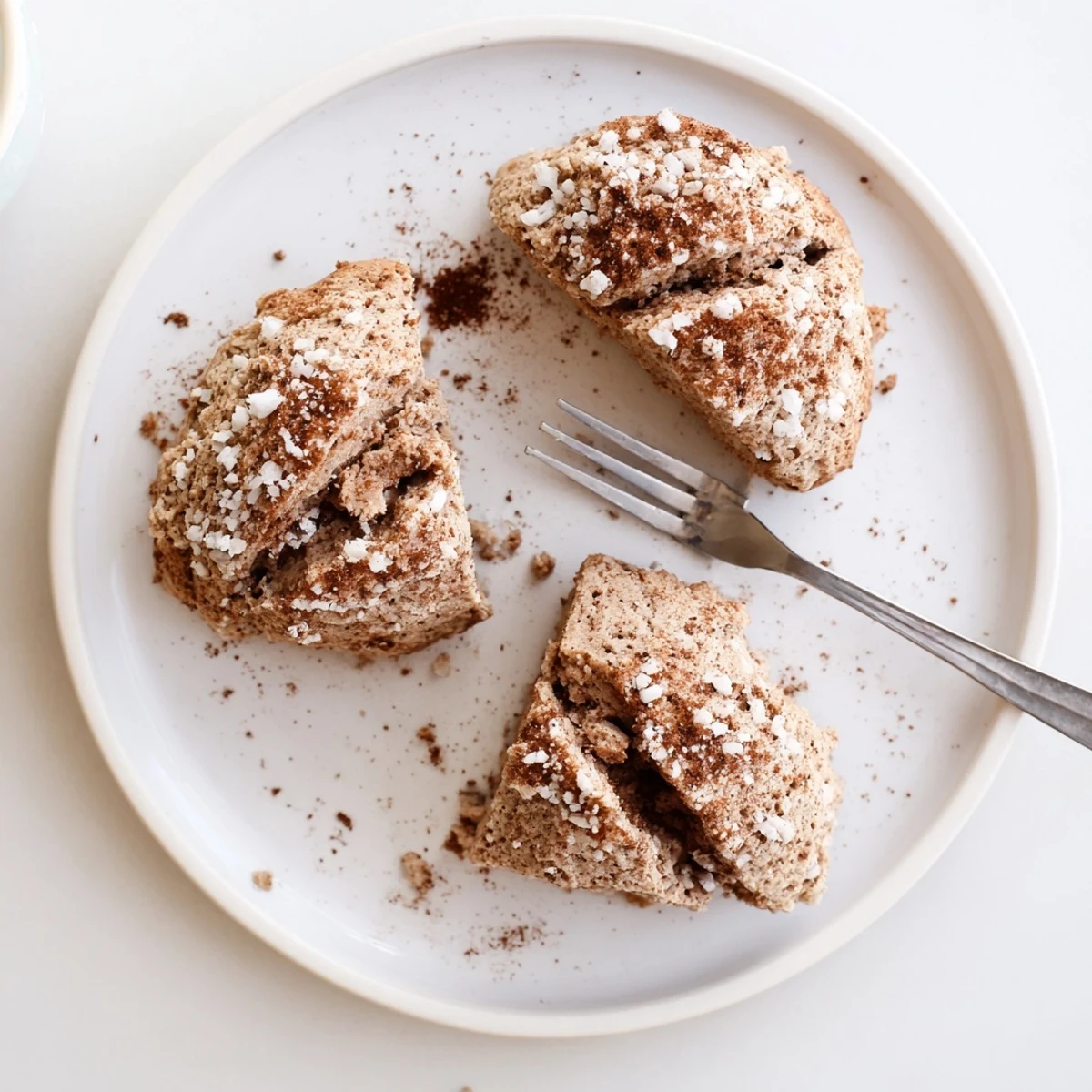 Warm Coffee Cream Soda Muffin Scones topped with cinnamon sugar, perfect for breakfast treats.  