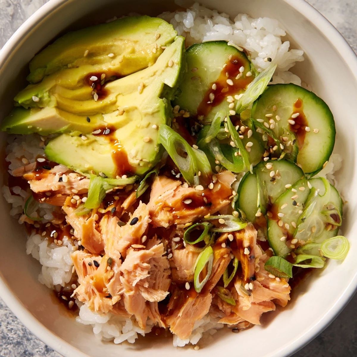 Quick Leftover Salmon & Rice Bowl serving warmth, flavor, and nutritious toppings for an easy meal.  