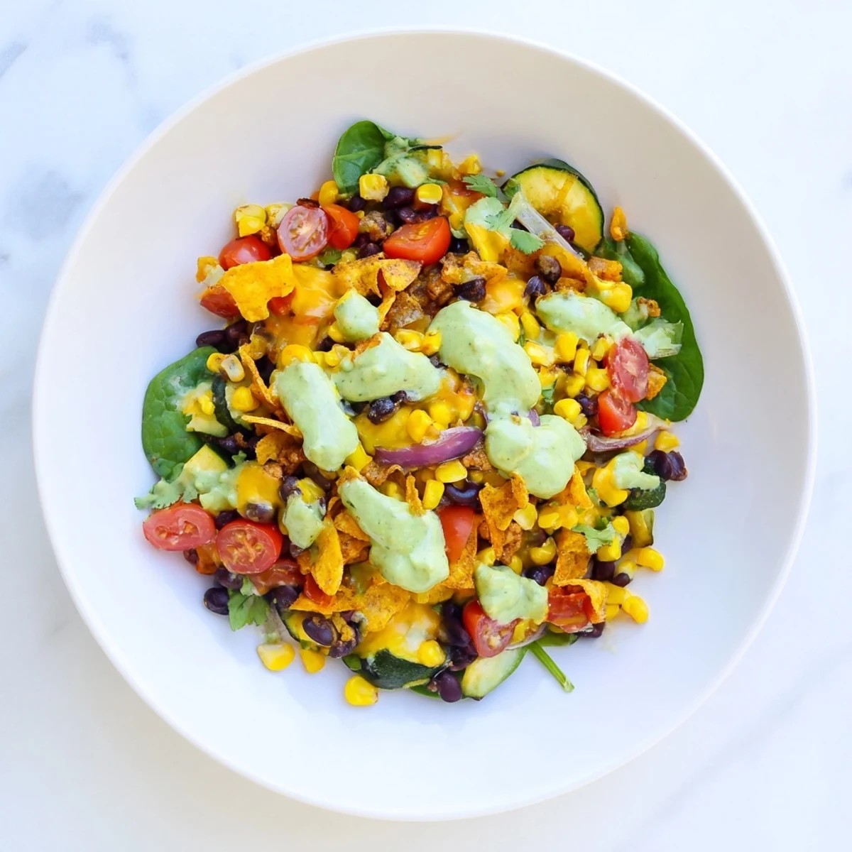 Close-up of a delicious Veggie-Packed Taco Skillet with Avocado Yogurt, showing fresh cilantro garnish.