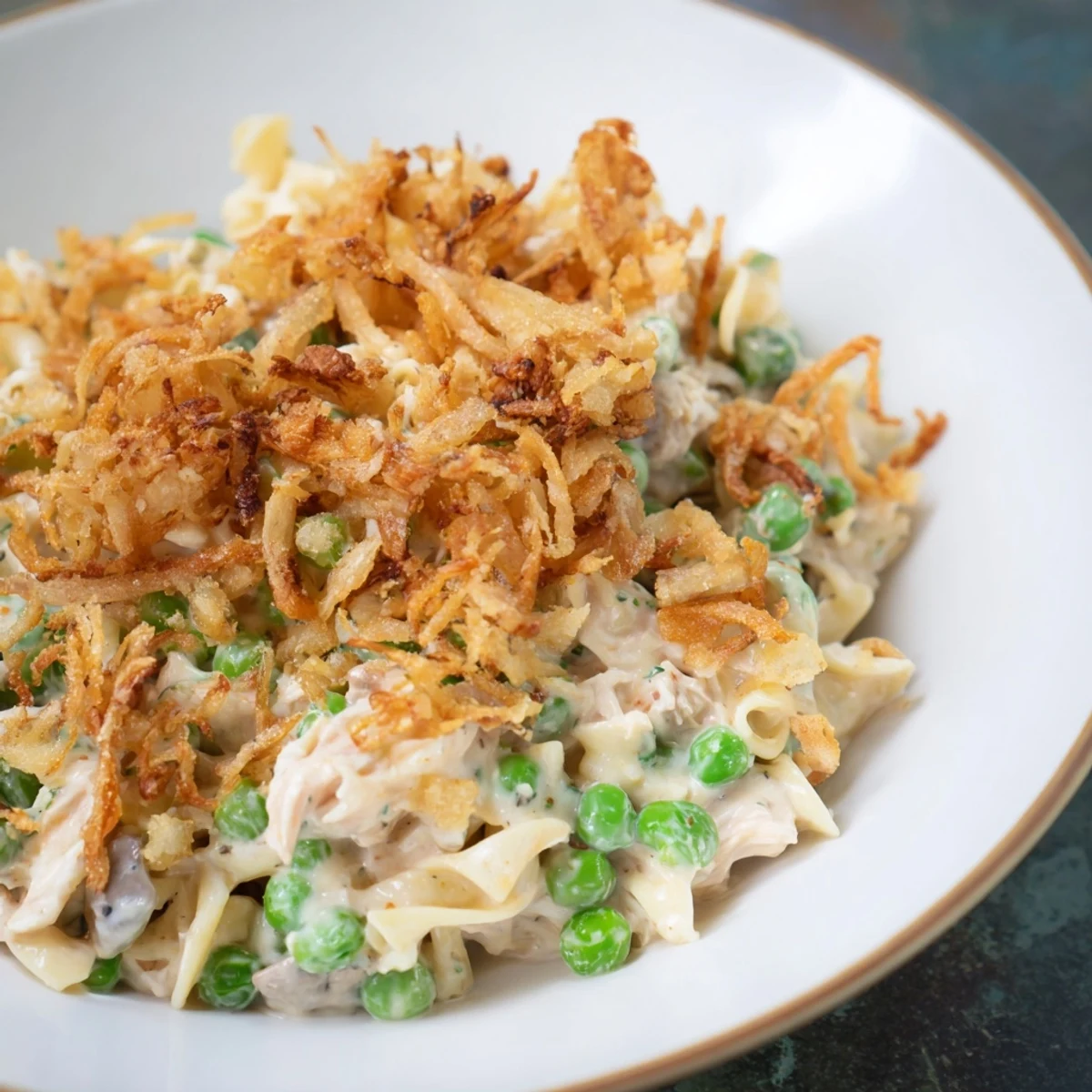 Tender egg noodles mingle with flaky tuna in this creamy Homemade Tuna Noodle Casserole.
