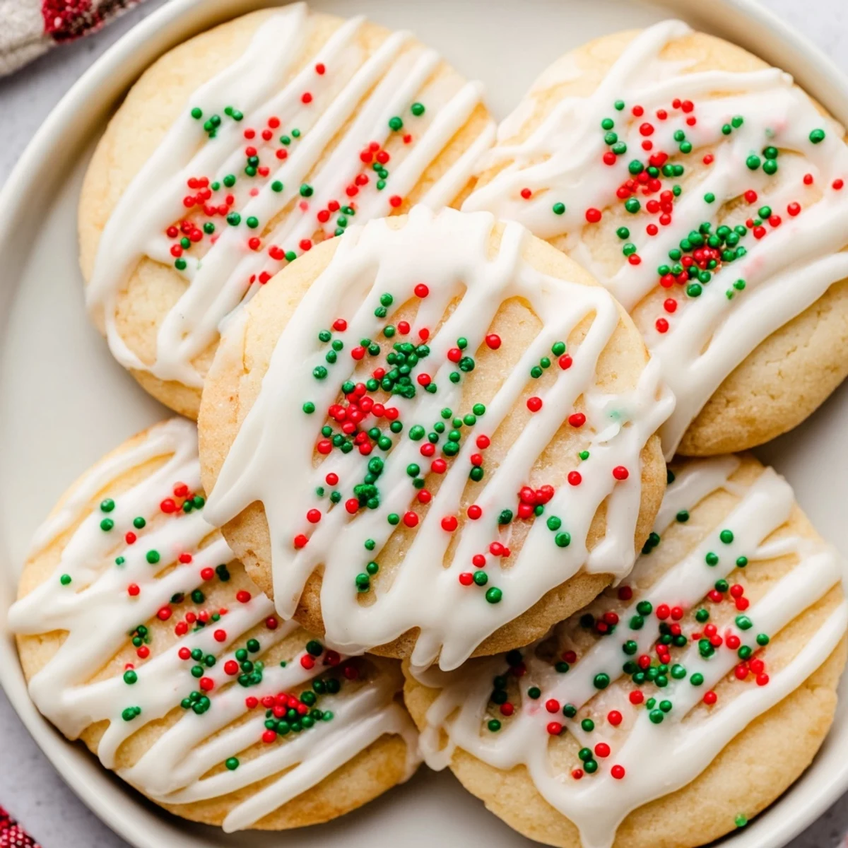 These delicious Holiday Cookies with Icing Drizzle, drizzled with colorful icing, are a Christmas treat.