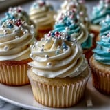 Elegant Cancer Birthday Cupcakes topped with pearl fondant, a delightful festive dessert.