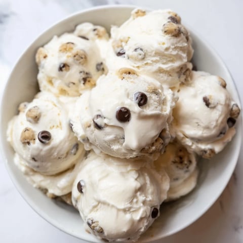 Indulge in creamy Cottage Cheese Ice Cream with Cookie Dough loaded with chocolate chips.  