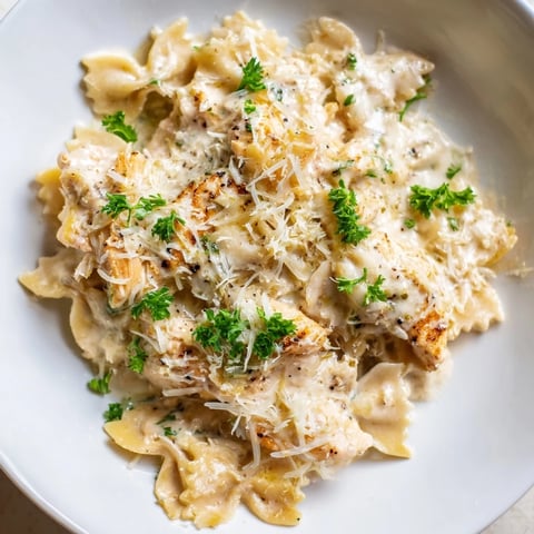 Tender Mozzarella Garlic Butter Chicken Bowties served with creamy sauce and herbs.  