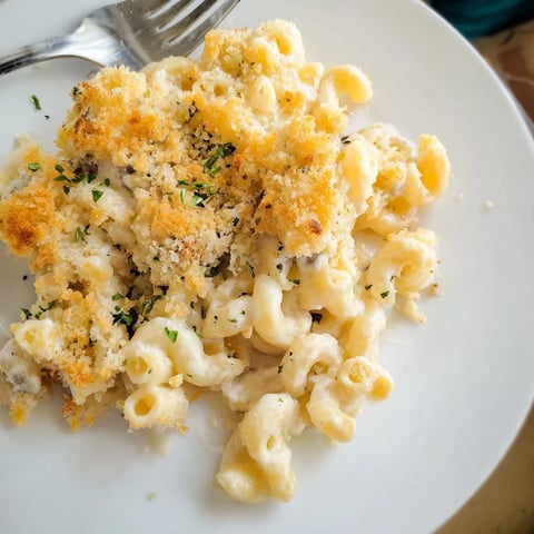 Decadent truffle macaroni and cheese topped with golden, crunchy panko breadcrumbs.  