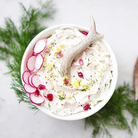 Festive Reindeer Antler Spread, a creamy appetizer, beautifully arranged with colorful veggie "antlers" on crackers.