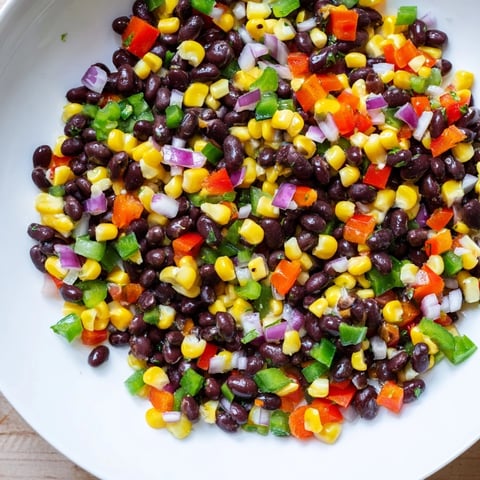 Vibrant Cowboy Caviar Salad bursting with colorful peppers, ready to serve as a refreshing side.