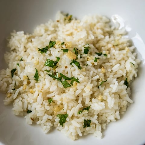 Fluffy jasmine rice garlic, infused with fragrant garlic, makes a delicious vegan side.