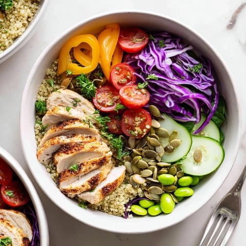 Vibrant Healthy Meal-Prep Bowls showing quinoa, grilled chicken, and fresh veggies in bright layers.  