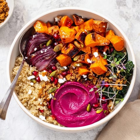 Nutrient-rich spiced winter bowls featuring colorful roasted vegetables and creamy toppings.  