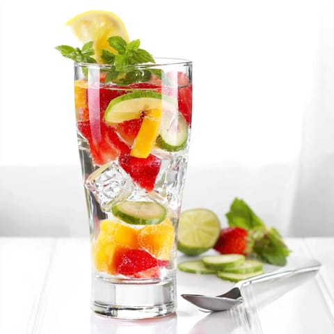 Colorful mocktail blend featuring ice, fruit, and flavor enhancers for summer.  