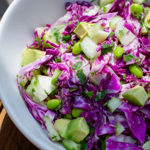 Fresh Green Goddess Detox Cabbage Salad, bursting with color, ready to enjoy as a light and refreshing lunch.