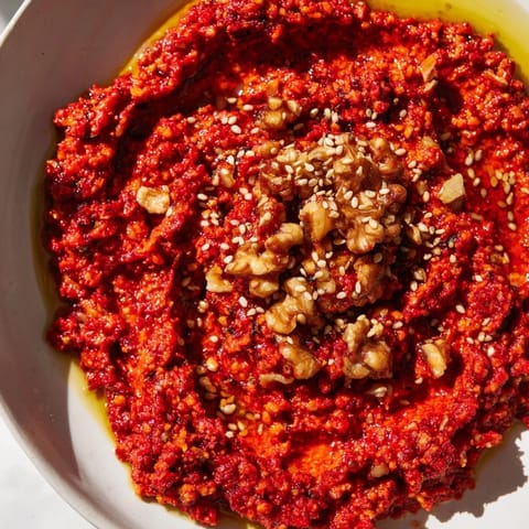 Freshly made Syrian Muhammara, a smoky, slightly spicy dip with toasted walnuts and olive oil.