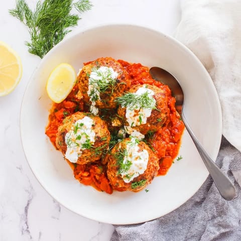 Instant Pot Greek-Style Meatballs with creamy lemon-feta, perfect for a flavorful weeknight meal.