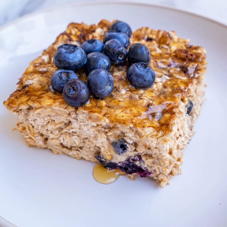 A close-up shot of warm Protein Pancake Oats, promising a high-protein, delicious breakfast treat.